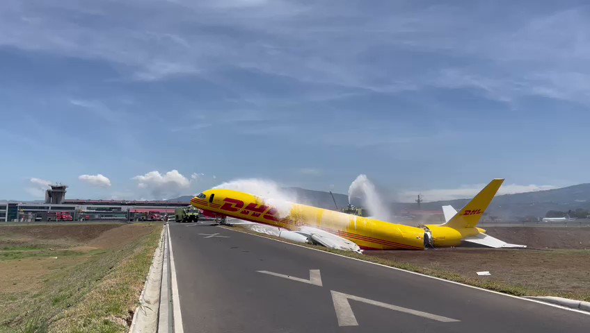 UH: Firefighters attend DHL aircraft, (Boeing757, HP-2010DAE) after leaving runway 07 at the Juan Santamaría SJO Costa Rican Airport