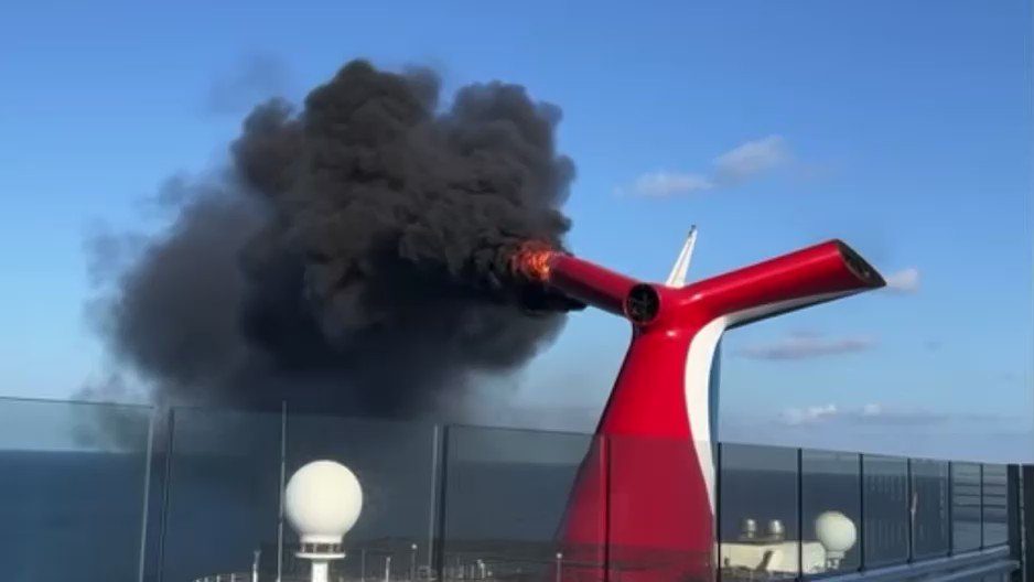 Kevin Novak shot this video this morning. It shows fire in Carnival Freedom's funnel. Novak is on Mardi Gras. He said Mardi Gras sent a fire brigade over to assist. Both ships in Grand Turk.