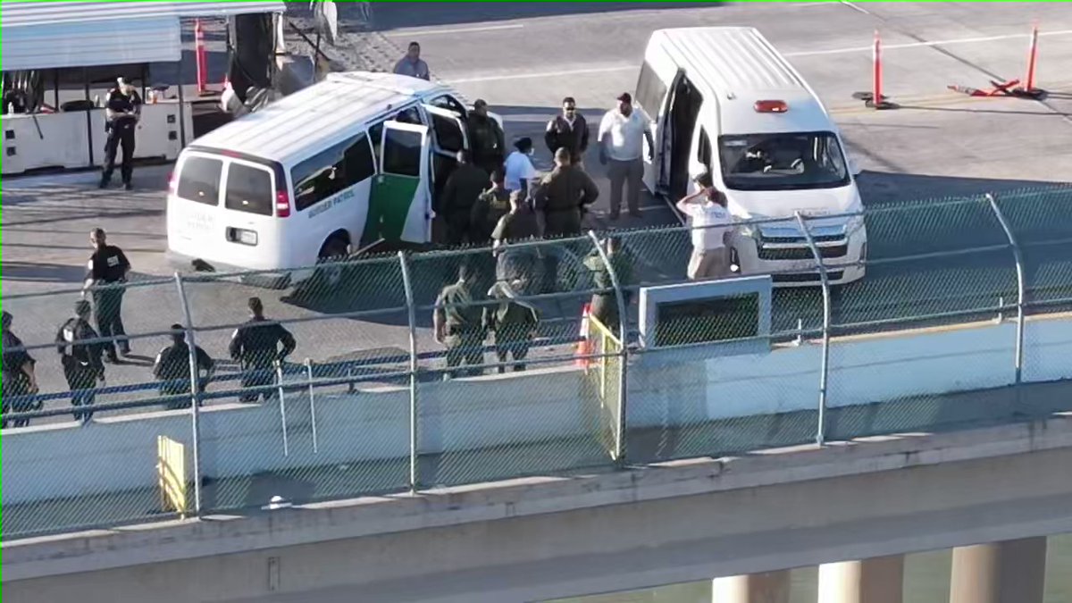 First group of Venezuelans being expelled back to Mexico via new DHS T42 rule in van-to-van transfer from BP to INM in middle of international bridge between Eagle Pass and Piedras Negras